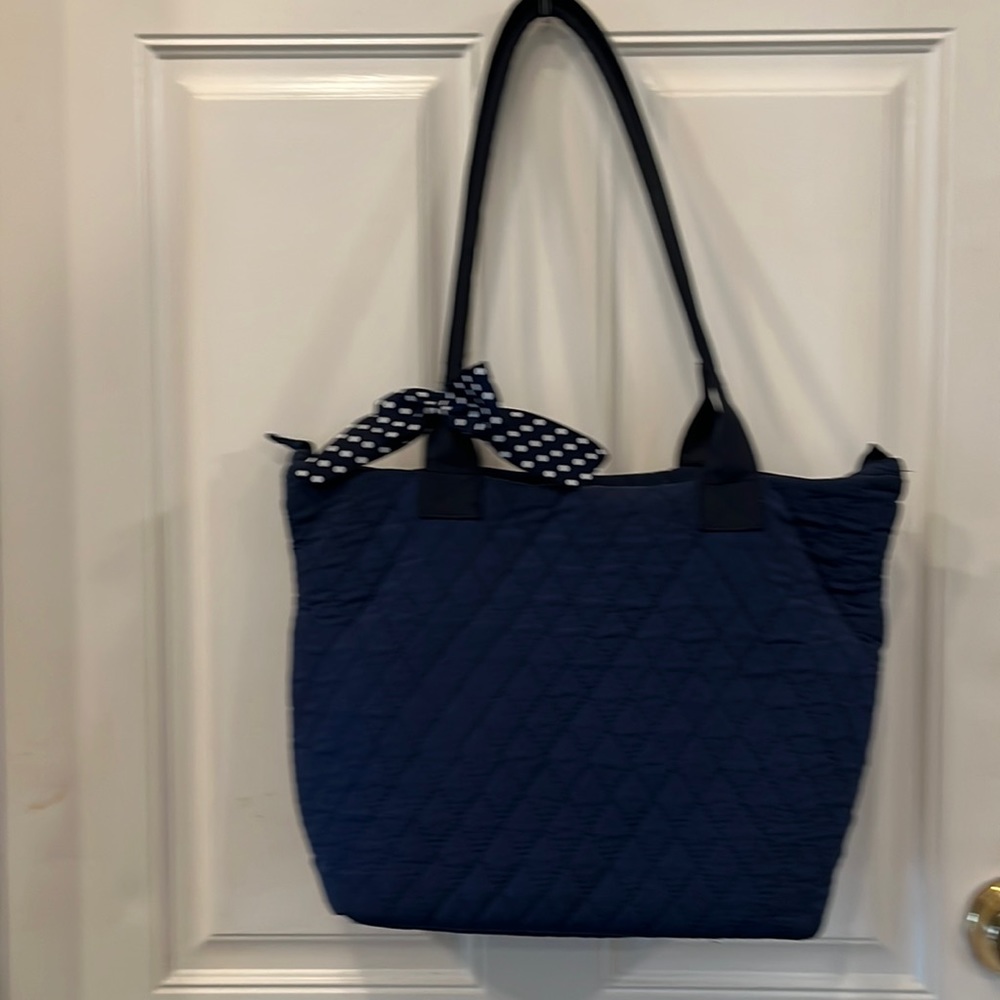 Navy tote/purse cloth diamond stitch with polkadot bow checkered inside lining